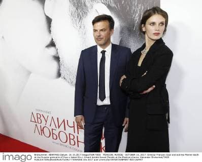 MOSCOW, RUSSIA - OCTOBER 16, 2017: Director Francois Ozon and actress Marine Vacth at the Russian premiere of Ozon s latest film L Amant double Amant Double at the Moskva cinema. Alexander Shcherbak TASS  TS064D5E