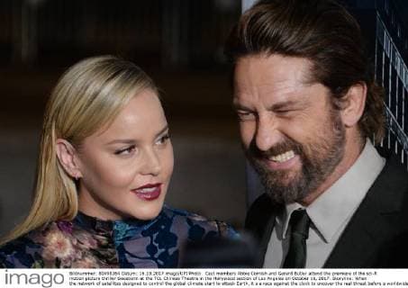 Cast members Abbie Cornish and Gerard Butler attend the premiere of the sci-fi motion picture thriller Geostorm at the TCL Chinese Theatre in the Hollywood section of Los Angeles on October 16, 2017. Storyline: When the network of satellites designed to control the global climate start to attack Earth, it s a race against the clock to uncover the real threat before a worldwide geostorm wipes out everything and everyone.  LAP2017101623 JIMxRUYMEN