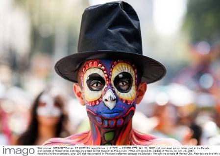 (171022) -- MEXICO CITY, Oct. 22, 2017 -- A costumed person takes part in the Parade and Contest of Monumental Alebrijes organized by the Museum of Popular Art (MPA) in Mexico City, capital of Mexico, on Oct. 21, 2017. According to the organizers, over 180 alebrijes created by Mexican craftsmen paraded on Saturday through the streets of Mexico City. Alebrijes are brightly colored folk art sculptures of fantastical creature. ) (da) (fnc) MEXICO-MEXICO CITY-CULTURAL EVENT FranciscoxCanedo 