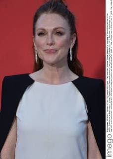 Cast member Julianne Moore attends the premiere of the motion picture crime thriller Suburbicon at the Regency Village Theatre in the Westwood section of Los Angeles on October 22, 2017. Storyline: Suburbicon is a peaceful, idyllic suburban community with affordable homes and manicured lawnsÉthe perfect place to raise a family, and in the summer of 1959, the Lodge family is doing just that. But the tranquil surface masks a disturbing reality, as husband and father Gardner Lodge (Matt.Damon) must navigate the townÕs dark underbelly of betrayal, deceit, and violence. This is a tale of.very flawed people making very bad choices. This is Suburbicon.  LAP2017102213 JIMxRUYMEN