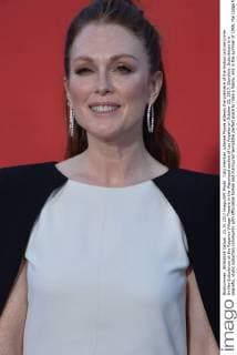 Cast member Julianne Moore attends the premiere of the motion picture crime thriller Suburbicon at the Regency Village Theatre in the Westwood section of Los Angeles on October 22, 2017. Storyline: Suburbicon is a peaceful, idyllic suburban community with affordable homes and manicured lawnsÉthe perfect place to raise a family, and in the summer of 1959, the Lodge family is doing just that. But the tranquil surface masks a disturbing reality, as husband and father Gardner Lodge (Matt.Damon) must navigate the townÕs dark underbelly of betrayal, deceit, and violence. This is a tale of.very flawed people making very bad choices. This is Suburbicon.  LAP2017102214 JIMxRUYMEN