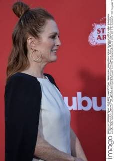 Cast member Julianne Moore attends the premiere of the motion picture crime thriller Suburbicon at the Regency Village Theatre in the Westwood section of Los Angeles on October 22, 2017. Storyline: Suburbicon is a peaceful, idyllic suburban community with affordable homes and manicured lawnsÉthe perfect place to raise a family, and in the summer of 1959, the Lodge family is doing just that. But the tranquil surface masks a disturbing reality, as husband and father Gardner Lodge (Matt.Damon) must navigate the townÕs dark underbelly of betrayal, deceit, and violence. This is a tale of.very flawed people making very bad choices. This is Suburbicon.  LAP2017102216 JIMxRUYMEN