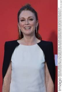 Cast member Julianne Moore attends the premiere of the motion picture crime thriller Suburbicon at the Regency Village Theatre in the Westwood section of Los Angeles on October 22, 2017. Storyline: Suburbicon is a peaceful, idyllic suburban community with affordable homes and manicured lawnsÉthe perfect place to raise a family, and in the summer of 1959, the Lodge family is doing just that. But the tranquil surface masks a disturbing reality, as husband and father Gardner Lodge (Matt.Damon) must navigate the townÕs dark underbelly of betrayal, deceit, and violence. This is a tale of.very flawed people making very bad choices. This is Suburbicon.  LAP2017102218 JIMxRUYMEN