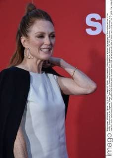 Cast member Julianne Moore attends the premiere of the motion picture crime thriller Suburbicon at the Regency Village Theatre in the Westwood section of Los Angeles on October 22, 2017. Storyline: Suburbicon is a peaceful, idyllic suburban community with affordable homes and manicured lawnsÉthe perfect place to raise a family, and in the summer of 1959, the Lodge family is doing just that. But the tranquil surface masks a disturbing reality, as husband and father Gardner Lodge (Matt.Damon) must navigate the townÕs dark underbelly of betrayal, deceit, and violence. This is a tale of.very flawed people making very bad choices. This is Suburbicon.  LAP2017102212 JIMxRUYMEN
