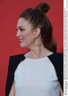 Cast member Julianne Moore attends the premiere of the motion picture crime thriller Suburbicon at the Regency Village Theatre in the Westwood section of Los Angeles on October 22, 2017. Storyline: Suburbicon is a peaceful, idyllic suburban community with affordable homes and manicured lawnsÉthe perfect place to raise a family, and in the summer of 1959, the Lodge family is doing just that. But the tranquil surface masks a disturbing reality, as husband and father Gardner Lodge (Matt.Damon) must navigate the townÕs dark underbelly of betrayal, deceit, and violence. This is a tale of.very flawed people making very bad choices. This is Suburbicon.  LAP2017102220 JIMxRUYMEN