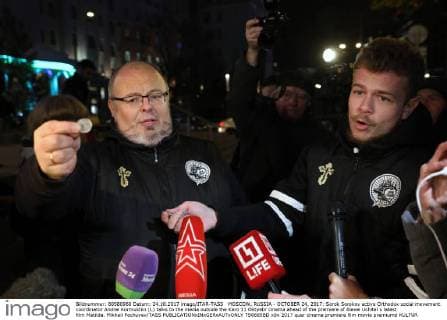MOSCOW, RUSSIA - OCTOBER 24, 2017: Sorok Sorokov active Orthodox social movement coordinator Andrei Kormukhin (L) talks to the media outside the Karo 11 Oktyabr cinema ahead of the premiere of Alexei Uchitel s latest film Matilda. Mikhail Pochuyev TASS  TS0665BD