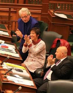 (171026) -- TORONTO, Oct. 26, 2017 -- Soo Wong (C), a member of Provincial Parliament of Canada s Ontario who tabled the motion, celebrates her motion approved with colleagues at the provincial parliament in Toronto, Canada, on Oct. 26, 2017. Canada s Ontario provincial parliament Thursday passed a motion designating Nanjing Massacre Commemorative Day to commemorate the mass killing of 300,000 Chinese by Japanese troops in Nanjing during World War II. ) CANADA-TORONTO-ONTARIO LEGISLATURE-NANJING MASSACRE COMMEMORATIVE DAY-MOTION ZouxZheng 