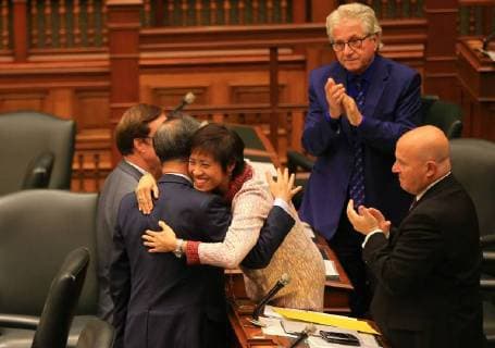 (171026) -- TORONTO, Oct. 26, 2017 -- Soo Wong (C), a member of Provincial Parliament of Canada s Ontario, celebrates her motion approved with colleagues at the provincial parliament in Toronto, Canada, on Oct. 26, 2017. Canada s Ontario provincial parliament Thursday passed a motion designating Nanjing Massacre Commemorative Day to commemorate the mass killing of 300,000 Chinese by Japanese troops in Nanjing during World War II. ) CANADA-TORONTO-ONTARIO LEGISLATURE-NANJING MASSACRE COMMEMORATIVE DAY-MOTION ZouxZheng 