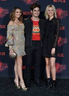 Actors Paris Berelc, Emery Kelly, and Isabel May (L-R) attend the premiere of Netflix s Stranger Things Season 2 at the Regency Bruin Theatre in Los Angeles on October 26, 2017. Storyline: When a young boy disappears, his mother, a police chief, and his friends must confront terrifying forces in order to get him back.  LAP2017102647 JIMxRUYMEN