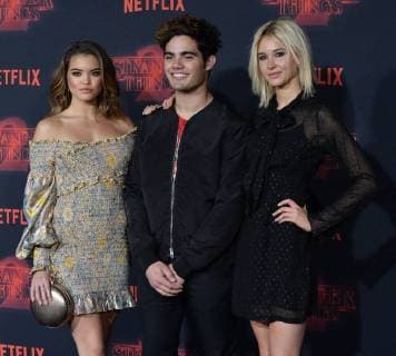 Actors Paris Berelc, Emery Kelly, and Isabel May (L-R) attend the premiere of Netflix s Stranger Things Season 2 at the Regency Bruin Theatre in Los Angeles on October 26, 2017. Storyline: When a young boy disappears, his mother, a police chief, and his friends must confront terrifying forces in order to get him back.  LAP2017102648 JIMxRUYMEN