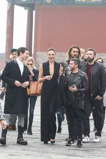(From back left) American actor and singer Ezra Miller, Israeli actress and model Gal Gadot, American actor and model Jason Momoa, and actor and director Ben Affleck visit the Temple of Heaven in heavy smog in Beijing, China, 27 October 2017. Gal Gadot leads co-stars of movie Justice League to visit Temple of Heaven in heavy smog in Beijing  pbu701405_03