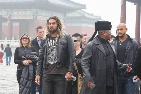 American actor and model Jason Momoa, left, visits the Temple of Heaven in heavy smog in Beijing, China, 27 October 2017. Gal Gadot leads co-stars of movie Justice League to visit Temple of Heaven in heavy smog in Beijing  pbu701405_07