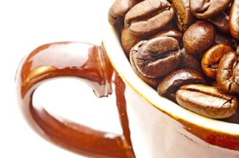 closeup of Coffee Beans in a Cup  1093502344