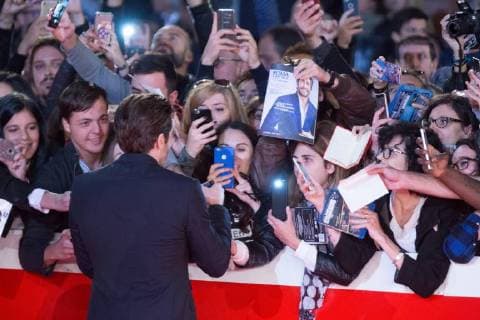 Rome: Red Carpet of movie Stronger US actor Jake Gyllenhaal sign autographs during the red carpet of the movie Stronger with US actor Jake Gyllenhaal during the third day of the Rome Film Fest Rome Italy Auditorium Parco della Musica  MatteoxNardone