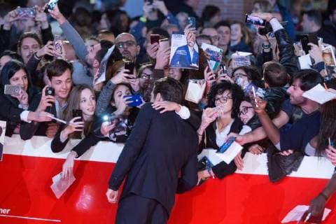 Rome: Red Carpet of movie Stronger US actor Jake Gyllenhaal sign autographs during the red carpet of the movie Stronger with US actor Jake Gyllenhaal during the third day of the Rome Film Fest Rome Italy Auditorium Parco della Musica  MatteoxNardone