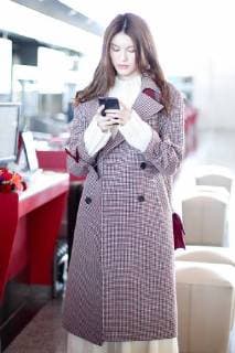 Chinese model He Sui is pictured at the Beijing Capital International Airport in Beijing, China, 30 October 2017. Loafer: Bally Bag: Dior Diorama He Sui flashes elegance and charm at Beijing airport  20171030_48939
