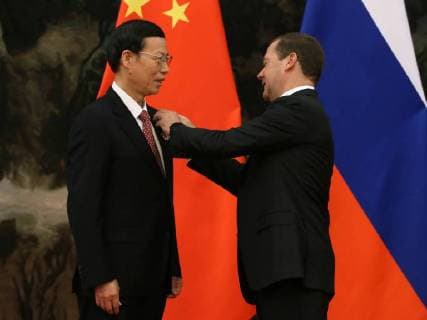 BEIJING, CHINA - NOVEMBER 1, 2017: China s First Vice Premier Zhang Gaoli (L) and Russia s Prime Minister Dmitry Medvedev at a ceremony to present Russian state awards to Chinese citizens. Yekaterina Shtukina Russian Government Press Office TASS  TS06753D