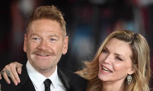 British actor Kenneth Branagh and American actress Michelle Pfeiffer attend the world premiere of Murder On The Orient Express at Royal Albert Hall in London on November 2, 2017.  LON20171102125 RUNExHELLESTAD