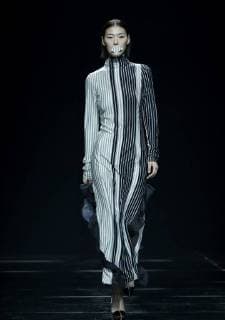 (171103) -- BEIJING, Nov. 3, 2017 -- A model presents a fashion creation during Asahi Kasei Future Star Innovation Award - Ji Feiyue Liu Feng Wan Ning Joint Collection at China Fashion Week S S 2018 in Beijing, capital of China, Nov. 3, 2017. )(zkr) CHINA-BEIJING-FASHION WEEK-XU HUACHENG (CN) ChenxJianli 