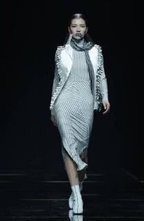 (171103) -- BEIJING, Nov. 3, 2017 -- A model presents a fashion creation during Asahi Kasei Future Star Innovation Award - Ji Feiyue Liu Feng Wan Ning Joint Collection at China Fashion Week S S 2018 in Beijing, capital of China, Nov. 3, 2017. )(zkr) CHINA-BEIJING-FASHION WEEK-XU HUACHENG (CN) ChenxJianli 