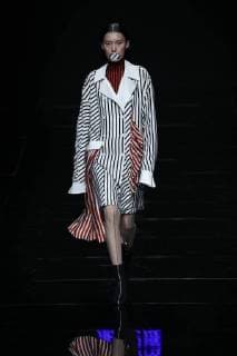 A model displays a new creation at the fashion show of Asahi Kasei Future Star Innovation Award¡ªJi Feiyue Liu Feng Wanning Joint Collection during the China Fashion Week Spring Summer 2018 in Beijing, China, 3 November 2017. Asahi Kasei Future Star Innovation Award¡ªJi Feiyue Liu Feng Wanning Joint Collection show at China Fashion Week Spring Summer 2018  20171103_10698