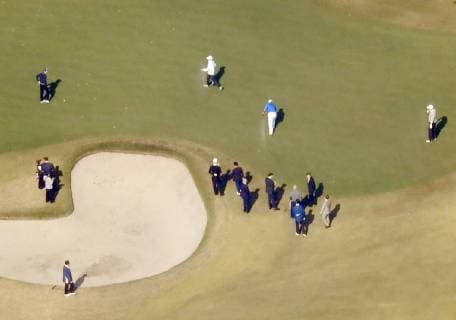 Trump in Japan U.S. President Donald Trump (R) and Japanese Prime Minister Shinzo Abe (L, top) watch professional golfer Hideki Matsuyama (C, blue top) at Kasumigaseki Country Club in Kawagoe, Saitama Prefecture, on Nov. 5, 2017. Photo was taken from a Kyodo News helicopter. 