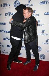 LOS ANGELES CA NOVEMBER 7 L L Cool J Shepard Fairey at Photo Op For Hulu s Obey Giant at the The Theatre at Ace Hotel in Los Angeles California on November 7 2017 Copyright: xFayexSadoux
