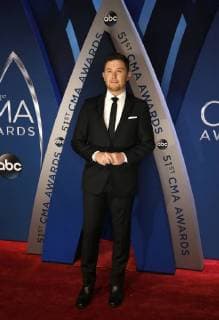 Scotty McCreery walks the red carpet as he arrives for the 51st Annual Country Music Association Awards on November 8, 2017 at the Bridgestone Arena in Nashville.  NAS20171108107 JOHNxSOMMERSxII