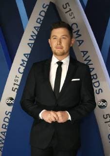 Scotty McCreery walks the red carpet as he arrives for the 51st Annual Country Music Association Awards on November 8, 2017 at the Bridgestone Arena in Nashville.  NAS20171108109 JOHNxSOMMERSxII
