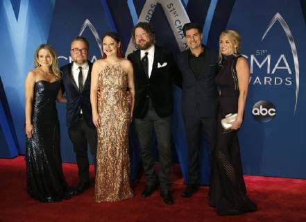 Hillary Lindsay (3rd-L) arrives with guests for the 51st Annual Country Music Association Awards on November 8, 2017 at the Bridgestone Arena in Nashville.  NAS20171108115 JOHNxSOMMERSxII
