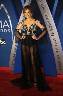Carly Pearce walks the red carpet as she arrives for the 51st Annual Country Music Association Awards on November 8, 2017 at the Bridgestone Arena in Nashville.  NAS20171108138 JOHNxSOMMERSxII