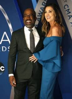 Darius Rucker and Beth Leonard walk the red carpet as they arrives for the 51st Annual Country Music Association Awards on November 8, 2017 at the Bridgestone Arena in Nashville.  NAS20171108158 JOHNxSOMMERSxII