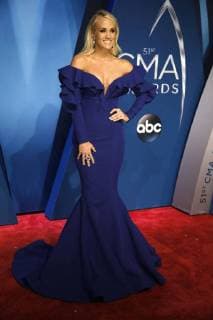 Carrie Underwood walks the red carpet as she arrives for the 51st Annual Country Music Association Awards on November 8, 2017 at the Bridgestone Arena in Nashville.  NAS20171108160 JOHNxSOMMERSxII