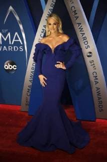 Carrie Underwood walks the red carpet as she arrives for the 51st Annual Country Music Association Awards on November 8, 2017 at the Bridgestone Arena in Nashville.  NAS20171108164 JOHNxSOMMERSxII