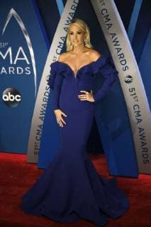 Carrie Underwood walks the red carpet as she arrives for the 51st Annual Country Music Association Awards on November 8, 2017 at the Bridgestone Arena in Nashville.  NAS20171108165 JOHNxSOMMERSxII