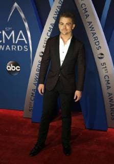 Hunter Hays walks the red carpet as he arrives for the 51st Annual Country Music Association Awards on November 8, 2017 at the Bridgestone Arena in Nashville.  NAS20171108168 JOHNxSOMMERSxII