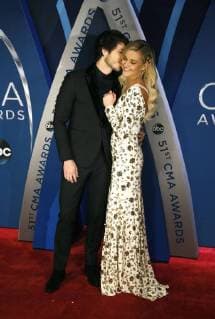 Morgan Evans (L) and Kelsea Ballerini arrive for the 51st Annual Country Music Association Awards on November 8, 2017 at the Bridgestone Arena in Nashville.  NAS20171108180 JOHNxSOMMERSxII