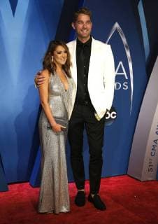 Brett Young arrives with a guest to the 51st Annual Country Music Association Awards on November 8, 2017 at the Bridgestone Arena in Nashville.  NAS20171108192 JOHNxSOMMERSxII