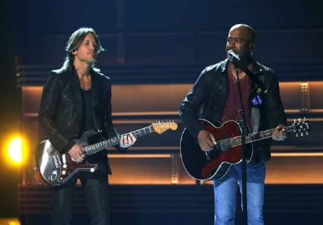 Keith Urban (L) and Darius Rucker perform onstage during the 51st Annual Country Music Association Awards on November 8, 2017 at the Bridgestone Arena in Nashville.  NAS20171108223 JOHNxSOMMERSxII