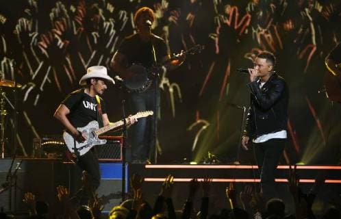 Brad Paisley and Kane Brown perform at the 51st Annual Country Music Association Awards on November 8, 2017 at the Bridgestone Arena in Nashville.  NAS20171108306 JOHNxSOMMERSxII