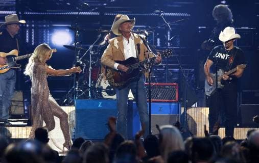 Alan Jackson (C), Carrie Underwood and Brad Paisley perform at the 51st Annual Country Music Association Awards on November 8, 2017 at the Bridgestone Arena in Nashville.  NAS20171108336 JOHNxSOMMERSxII
