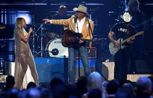 Alan Jackson (C), Carrie Underwood and Brad Paisley perform at the 51st Annual Country Music Association Awards on November 8, 2017 at the Bridgestone Arena in Nashville.  NAS20171108339 JOHNxSOMMERSxII