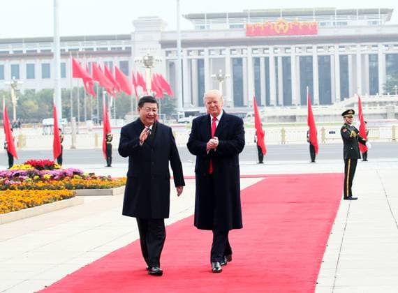 (171109) -- BEIJING, Nov. 9, 2017 -- Chinese President Xi Jinping (L) holds a grand ceremony to welcome U.S. President Donald Trump at the square outside the east gate of the Great Hall of the People in Beijing, capital of China, Nov. 9, 2017. ) (wf) CHINA-BEIJING-XI JINPING-TRUMP-WELCOME CEREMONY (CN) LanxHongguang 