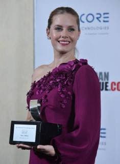 Actress Amy Adams holds the American Cinematheque Award during a photo-op at the entertainment industries annual gala at the Beverly Hilton Hotel in Beverly Hills, California on November 10, 2017. Adams was honored as an extraordinary artist in the entertainment industry currently making a significant contribution to the art of the moving picture.  LAP2017111003 JIMxRUYMEN
