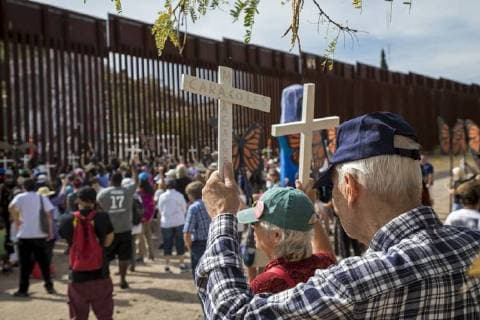 November 12, 2017 - Nogales, Arizona, U.S. - Nogales, Arizona USA - 12 November 2017 - A rally held on both sides of the U.S.-Mexico border fence remembers migrants who have died trying to cross the border. The rally was organized by the School of the Americas Watch, a group of religious and community activists. Nogales U.S. - ZUMAw66_ 20171112_zaf_w66_003 Copyright: xJimxWestx