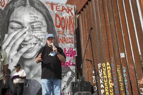 November 12, 2017 - Nogales, Sonora, U.S. - Nogales, Sonora Mexico - 12 November 2017 - Farther Roy Bourgeois speaks at a rally held at the U.S.-Mexico border fence to remember migrants who have died trying to cross the border. Farther Bourgois is the founder of the School of the Americas Watch, which organized the rally. Nogales U.S. - ZUMAw66_ 20171112_zaf_w66_006 Copyright: xJimxWestx