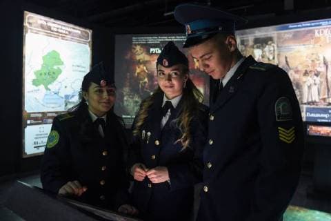 NOVOSIBIRSK, RUSSIA - NOVEMBER 12, 2017: Cadets view a multimedia exhibition at the Russia â€“ My History historical park opened in Oktyabrsky District. Kirill Kukhmar TASS  TS068C7F