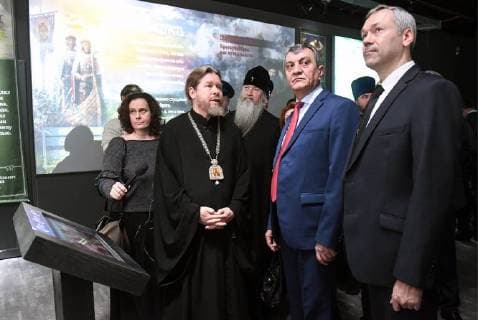 NOVOSIBIRSK, RUSSIA - NOVEMBER 12, 2017: Executive Secretary of the Patriarch s Council on Culture, Bishop Tikhon (Georgy Shevkunov) of Yegoryevsk, Metropolitan Tikhon of Novosibirsk and Berdsk, Presidential Envoy to Russia s Siberian Federal District Sergei Menyailo, and Novosibirsk Region acting governor Andrei Travnikov (L-R front) attend the opening of the Russia â€“ My History historical park in Oktyabrsky District. Kirill Kukhmar TASS  TS068C8D