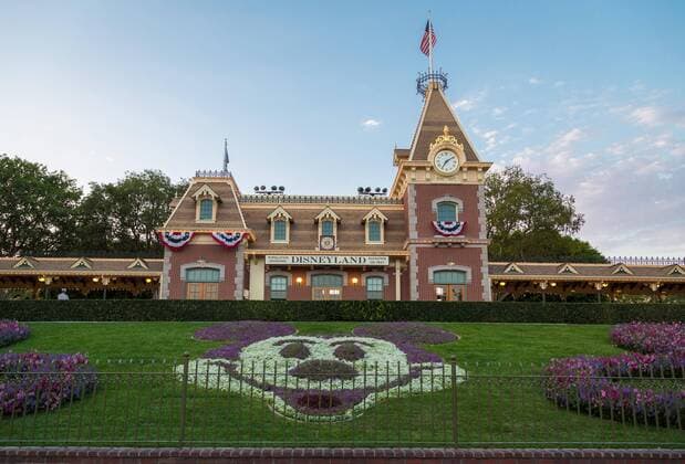 Disneyland Railroad Station front Mickey Mouse out Flowers Disneyland Resort Anaheim California USA North America Copyright: imageBROKER MarcxRasmus iblmra04590897.jpg