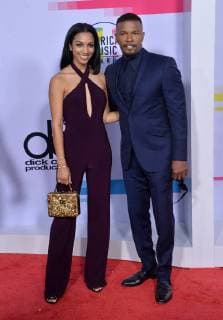 Actor Jamie Foxx and his daughter Corinne Foxx arrive for the annual American Music Awards held at Microsoft Theater in Los Angeles, on November 19, 2017.  LAP20171119125 JIMxRUYMEN
